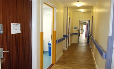 Colour coded corridor and toilet